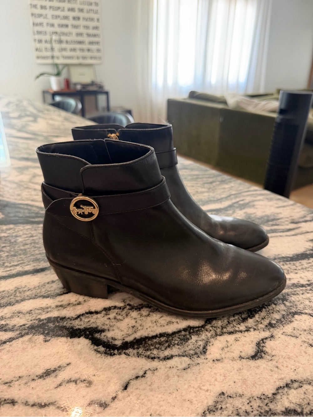 Coach Black Leather Ankle Booties with Gold Logo Accent